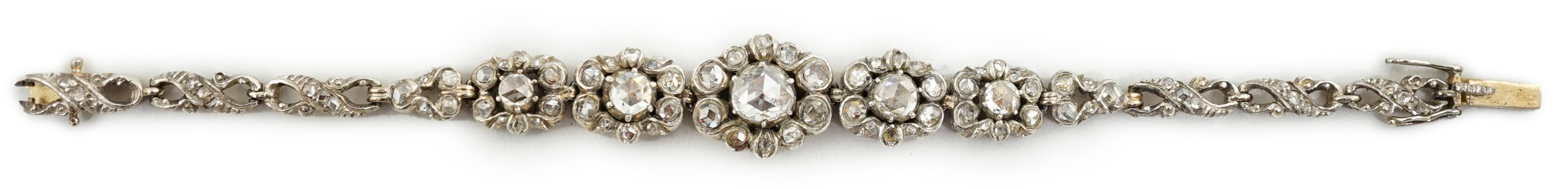 An early 20th century continental 14k gold and rose cut diamond cluster set bracelet